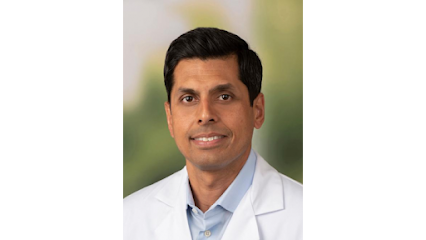 Tejas H Raval, MD